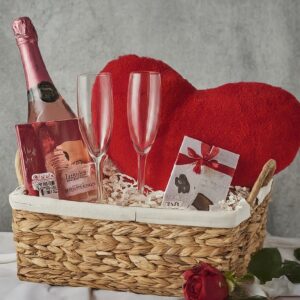 Give your Valentine the gift of love and cuddles with our Teddy Bear Hug Valentine's Hamper. This charming hamper comes with an adorable teddy bear, a bouquet of fresh roses, and a box of heart-shaped chocolates. It's the perfect way to warm their heart on Valentine's Day